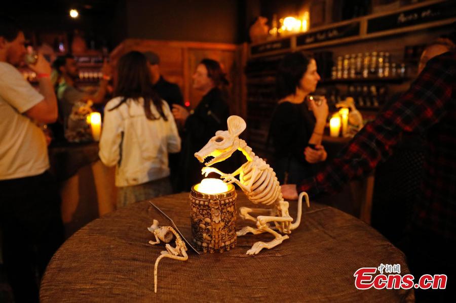 A pop-up Rat Bar in San Francisco offers patrons the chance to hold and play with rats while they drink, June 12, 2019. The animals are clean, domesticated rats, provided by a group specializing in finding homes for small animals and rodents. The bar is charging $49.99 per person for the experience. (Photo: China News Service/Liu Guanguan)