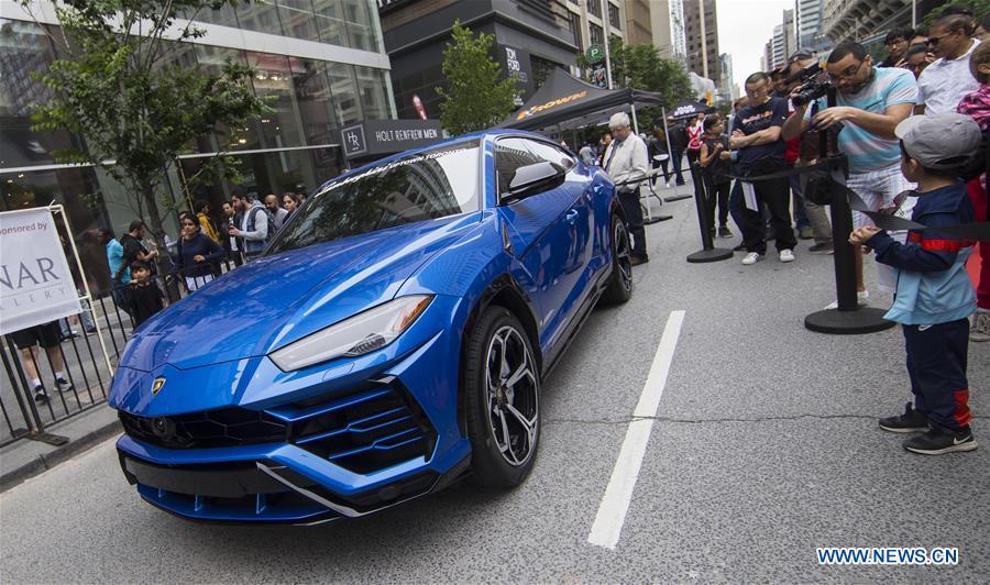 A Lamborghini Urus is seen during the 2019 Yorkville Exotic Car Show in Toronto, Canada, June 16, 2019. More than 110 classic and exotic cars were displayed at the annual Father\'s Day event on Sunday, attracting tens of thousands of visitors. (Xinhua/Zou Zheng)