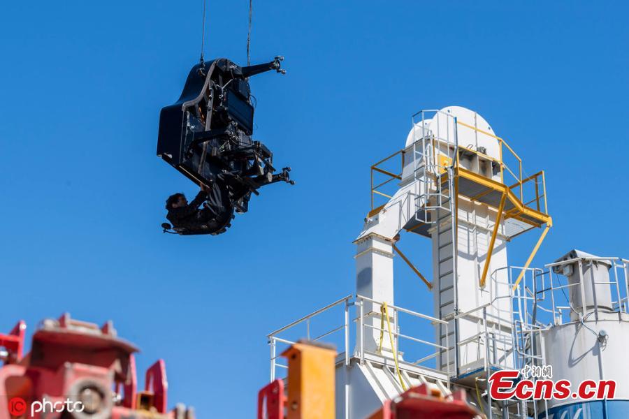 Pianist-composer Alain Roche played his vertical piano during a performance on the occasion of an Open Day at the construction site of the future Theatre de Carouge, in Carouge near Geneva, Switzerland, Sunday, June 15, 2019. (Photo/IC)