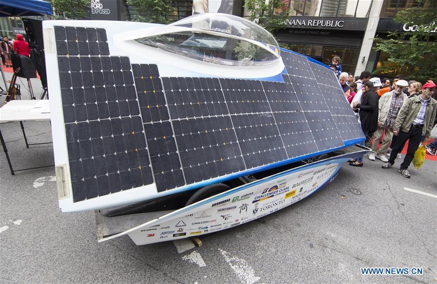 A solar vehicle is seen during the 2019 Yorkville Exotic Car Show in Toronto, Canada, June 16, 2019. More than 110 classic and exotic cars were displayed at the annual Father\'s Day event on Sunday, attracting tens of thousands of visitors. (Xinhua/Zou Zheng)