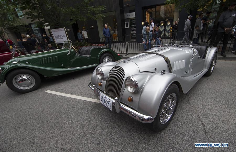 A 1968 Morgan (R) is seen during the 2019 Yorkville Exotic Car Show in Toronto, Canada, June 16, 2019. More than 110 classic and exotic cars were displayed at the annual Father\'s Day event on Sunday, attracting tens of thousands of visitors. (Xinhua/Zou Zheng)