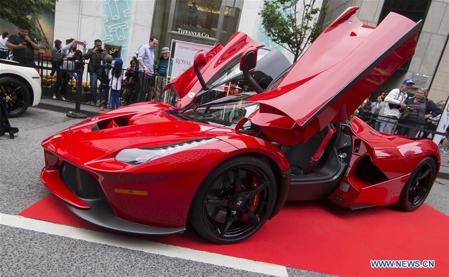 A Ferrari F150 is seen during the 2019 Yorkville Exotic Car Show in Toronto, Canada, June 16, 2019. More than 110 classic and exotic cars were displayed at the annual Father\'s Day event on Sunday, attracting tens of thousands of visitors. (Xinhua/Zou Zheng)