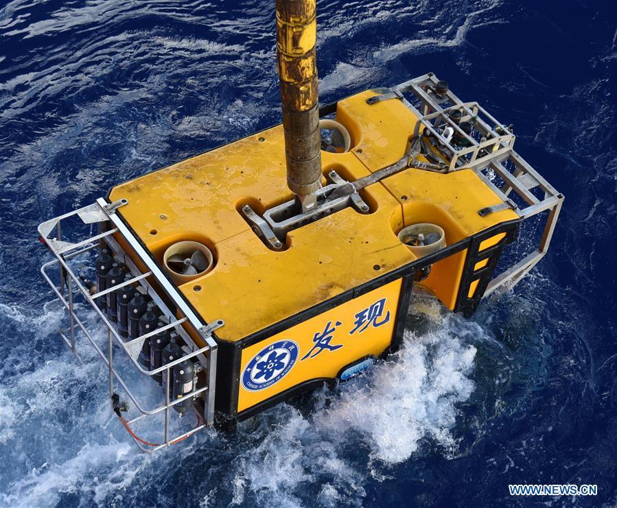 Photo taken on May 27, 2019 shows Discovery, a remote operated vehicle aboard China\'s research vessel KEXUE (Science), returning from a dive in western Pacific Ocean. KEXUE finished its investigation of seamounts in the west of the Pacific Ocean and started to sail back on June 15. During the expedition, Discovery, a remote operated vehicle aboard KEXUE, made 19 dives and captured more than 800 collections of biological samples, including corals, sponges, shrimps and shellfishes. \