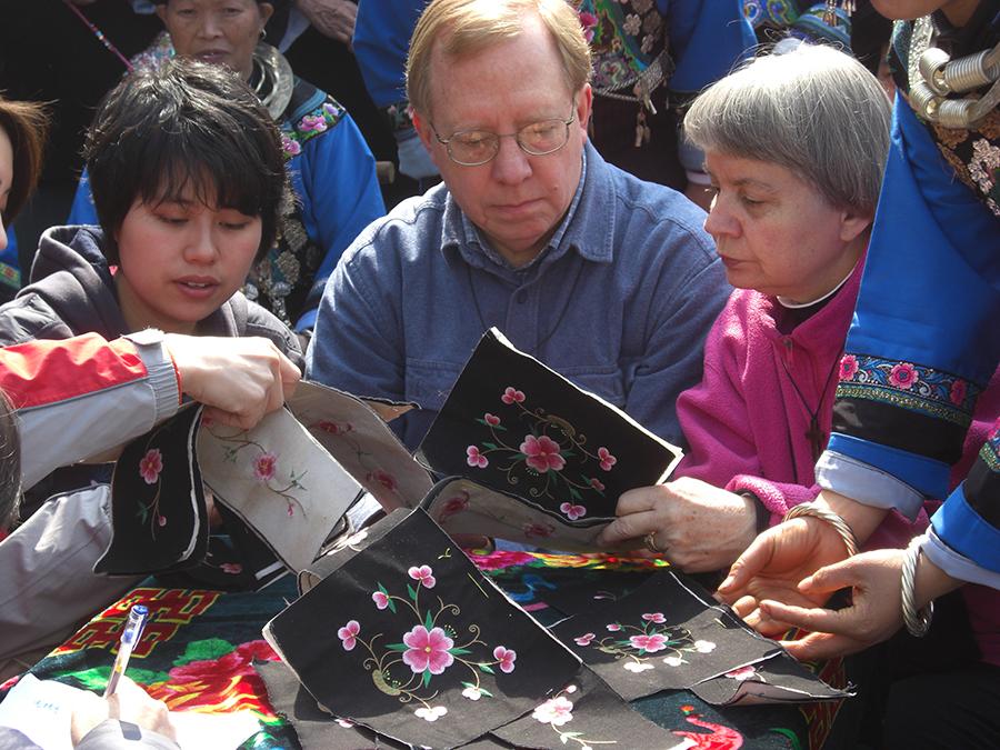 Paul and Dorothy Lacy are pictured inspecting embroideries in 2009. (Photo provided to chinadaily.com.cn)

Now they have two physical stores in Hong Kong and a big one in Chengdu. In the meantime, their products are available on their website, where customers from around the world can buy the exquisite Miao hand embroidery.

Generally, customers are mainly foreigners who love Chinese handicrafts. They recall a British woman traveling in Chengdu who bought all of the products in the store. She said she was a collector of Chinese handicrafts and she also wanted to help the locals get out of poverty by buying their products.