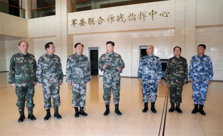 Chinese President Xi Jinping (C), who is also general secretary of the Communist Party of China Central Committee and chairman of the Central Military Commission (CMC) and commander in chief of the CMC joint battle command center, inspects the command center with other members of the CMC on Nov. 3, 2017. Xi Jinping on Friday instructed the armed forces to improve their combat capability and readiness for war. (Xinhua/Li Gang) Chinese President Xi Jinping (C), who is also general secretary of the Communist Party of China Central Committee and chairman of the Central Military Commission (CMC) and commander in chief of the CMC joint battle command center, inspects the command center with other members of the CMC on Nov. 3, 2017. Xi Jinping on Friday instructed the armed forces to improve their combat capability and readiness for war. (Xinhua/Li Gang)