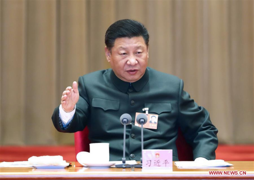 Chinese President Xi Jinping, also general secretary of the Communist Party of China (CPC) Central Committee and chairman of the Central Military Commission, speaks when attending a plenary meeting of the delegation of People's Liberation Army and armed police at the ongoing session of the 13th National People's Congress in Beijing, capital of China, March 12, 2018. (Photo/Xinhua) Chinese President Xi Jinping, also general secretary of the Communist Party of China (CPC) Central Committee and chairman of the Central Military Commission, speaks when attending a plenary meeting of the delegation of People's Liberation Army and armed police at the ongoing session of the 13th National People's Congress in Beijing, capital of China, March 12, 2018. (Photo/Xinhua)