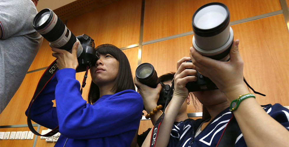 Female journalists keep working on Women's Day 