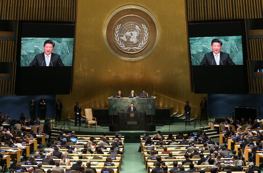 Xi