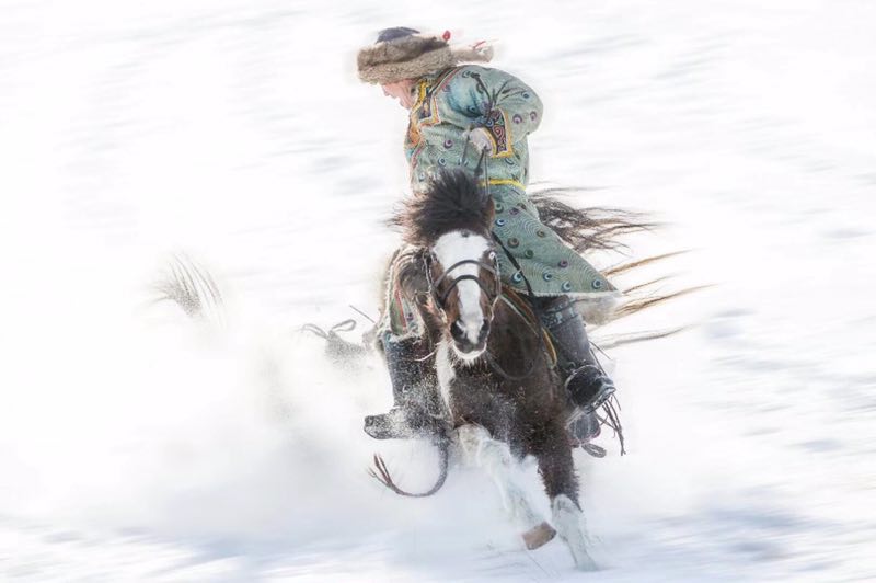 Women ride horses on Xilin Gol Grassland