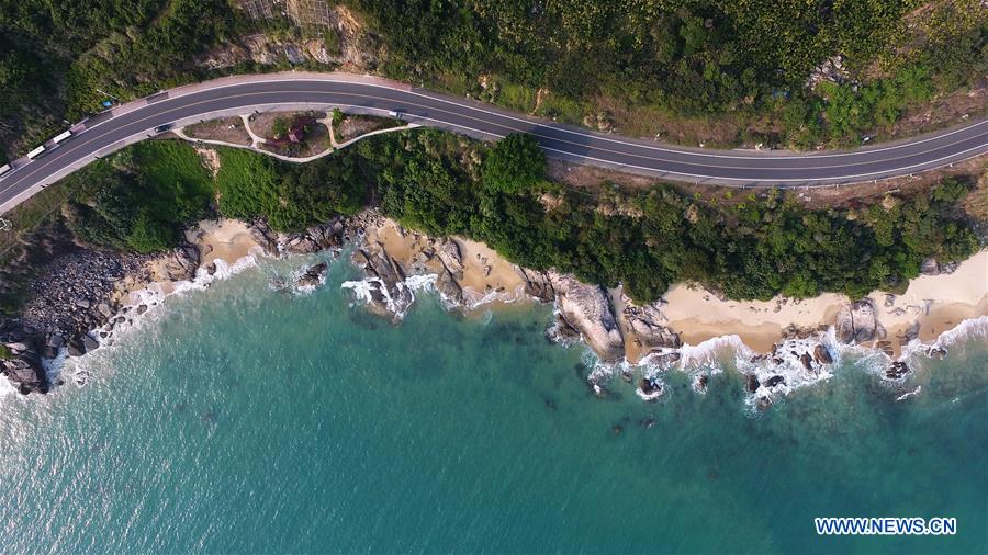 Aerial view of seaside sightseeing highway in Wanning, S China