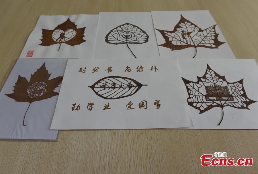 Students depict university scenes in leaves