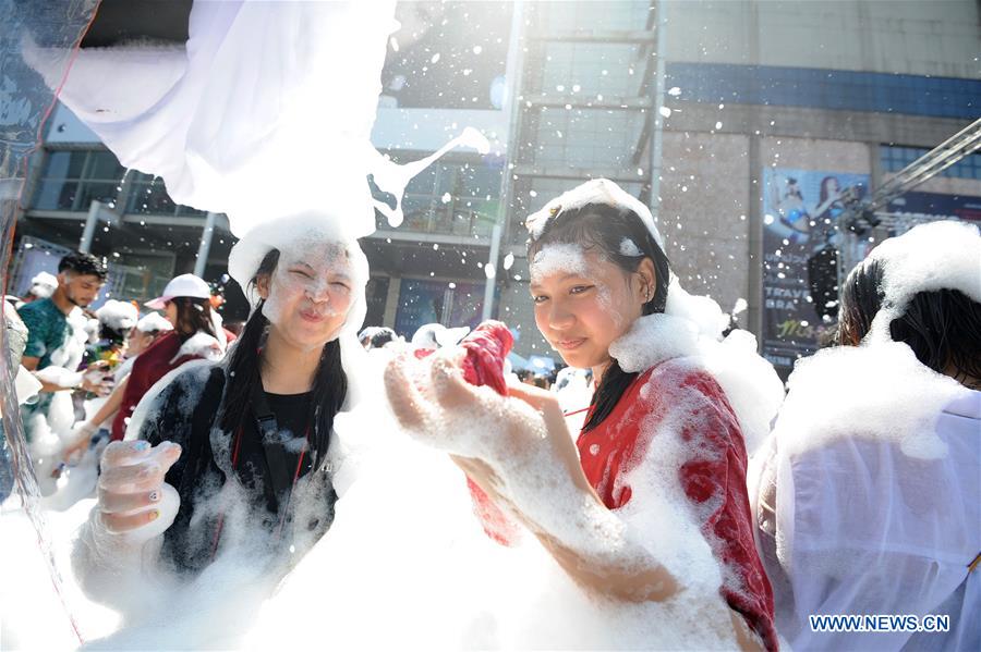 People celebrate Songkran Festival in Thailand