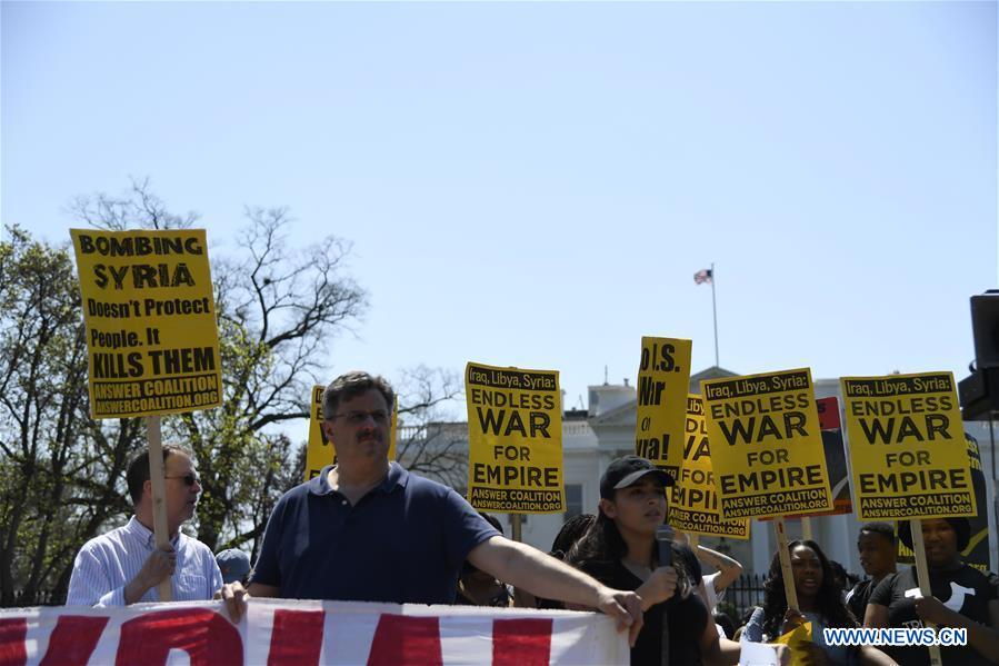 People protest against U.S. strike on Syria in Washington D.C.