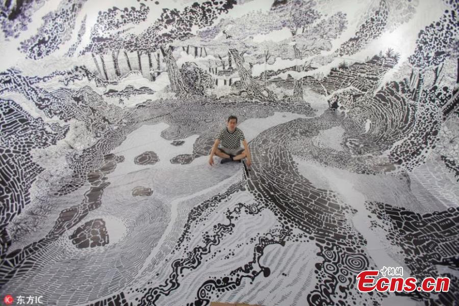 Artist uses 120 marker pens to create immersive drawing 