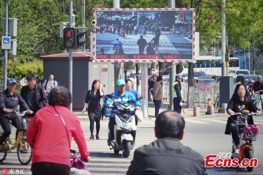 Beijing installs system to encourage orderly pedestrians 