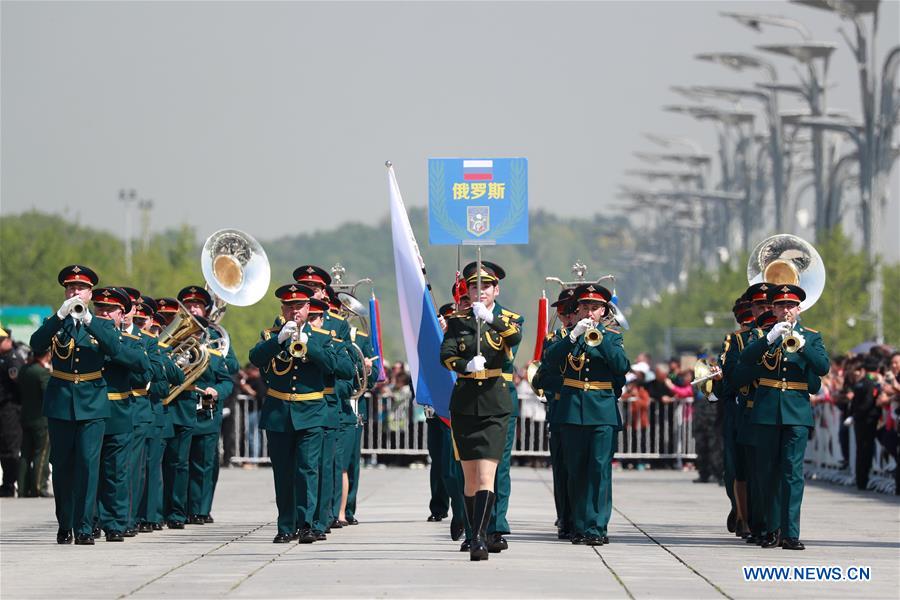 8 countries take part in military band parade at Beijing Olympic Park
