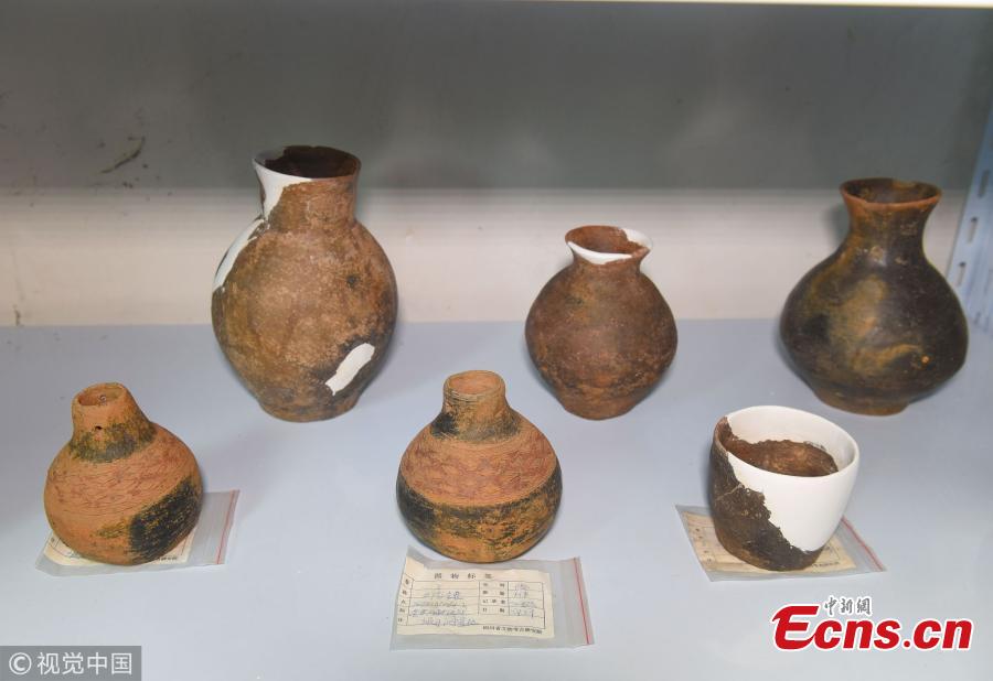 Over 1,000 relics found at stone coffins site