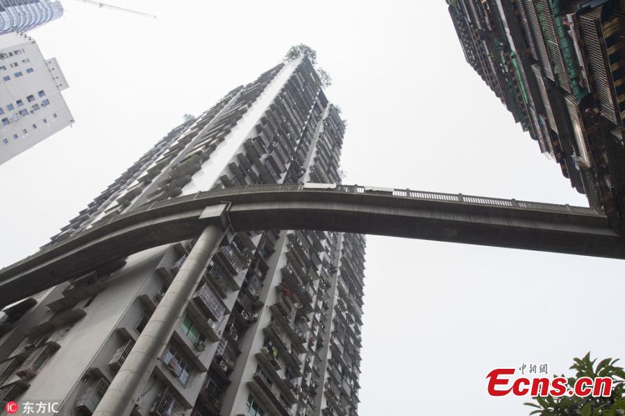 Pedestrian bridge links 13th floor with road 