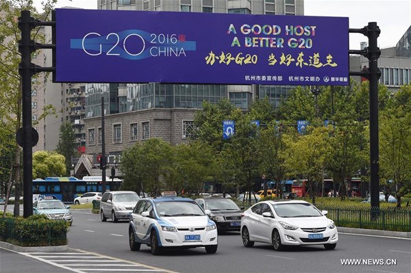 Cars move on a street in Hangzhou, capital of east China's Zhejiang Province, Aug. 27, 2016. The 11th G20 summit will be held from Sept. 4 to 5 in Hangzhou. (Xinhua/Ju Huanzong) Cars move on a street in Hangzhou, capital of east China's Zhejiang Province, Aug. 27, 2016. The 11th G20 summit will be held from Sept. 4 to 5 in Hangzhou. (Xinhua/Ju Huanzong)