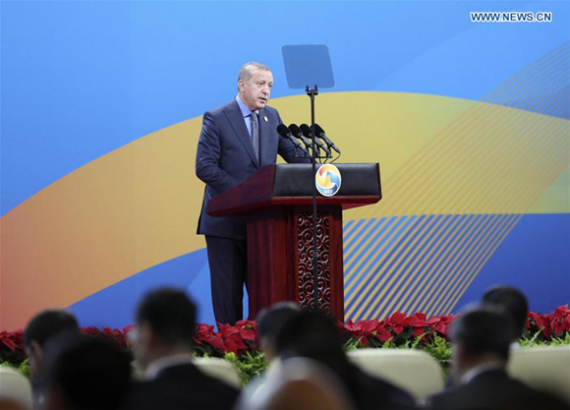 Turkish President Recep Tayyip Erdogan addresses the opening ceremony of the Belt and Road Forum for International Cooperation in Beijing, capital of China, May 14, 2017. (Xinhua/Pang Xinglei) BEIJING, May 14 (Xinhua) -- Turkey will take advantage of its unique geographical position in supporting the initiative on the construction of the Silk Road Economic Belt and the 21st Century Maritime Silk Road (the Belt and Road Initiative), Turkish President Recep Tayyip Erdogan said here on Sunday. Sitting at the crossroad of Asia and Europe, Turkey wishes to bring its unique geographical location into full play, Erdogan said at the opening ceremony of the Belt and Road International Cooperation Forum. Turkey has already started a series of infrastructure projects to boost inter-connectivity between the two continents, Erdogan noted. He called on the two sides to better coordinate the Belt and Road Initiative and Turkey's Middle Corridor project that links the country with central Asia and China. Erdogan also pledged Turkey will provide full support for the Belt and Road Initiative, which is proposed by Chinese President Xi Jinping in 2013 and, which aims to build a trade and infrastructure network along ancient trade routes connecting Asia with Europe, Africa and beyond. Turkish President Recep Tayyip Erdogan addresses the opening ceremony of the Belt and Road Forum for International Cooperation in Beijing, capital of China, May 14, 2017. (Xinhua/Pang Xinglei) BEIJING, May 14 (Xinhua) -- Turkey will take advantage of its unique geographical position in supporting the initiative on the construction of the Silk Road Economic Belt and the 21st Century Maritime Silk Road (the Belt and Road Initiative), Turkish President Recep Tayyip Erdogan said here on Sunday. Sitting at the crossroad of Asia and Europe, Turkey wishes to bring its unique geographical location into full play, Erdogan said at the opening ceremony of the Belt and Road International Cooperation Forum. Turkey has already started a series of infrastructure projects to boost inter-connectivity between the two continents, Erdogan noted. He called on the two sides to better coordinate the Belt and Road Initiative and Turkey's Middle Corridor project that links the country with central Asia and China. Erdogan also pledged Turkey will provide full support for the Belt and Road Initiative, which is proposed by Chinese President Xi Jinping in 2013 and, which aims to build a trade and infrastructure network along ancient trade routes connecting Asia with Europe, Africa and beyond.